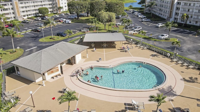 view of swimming pool with a water view