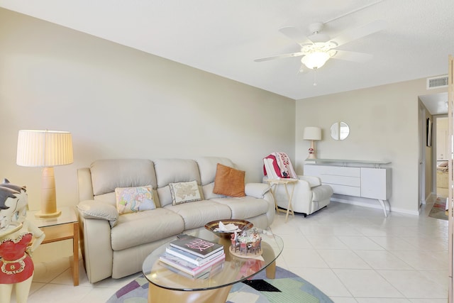 tiled living room featuring ceiling fan