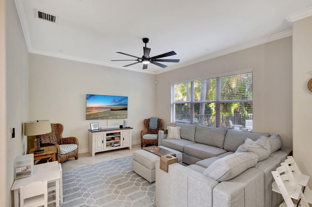 tiled living room featuring crown molding and ceiling fan