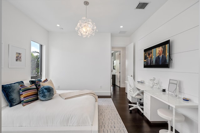 bedroom featuring dark hardwood / wood-style flooring