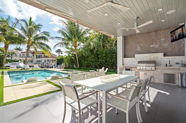 view of patio / terrace featuring grilling area, ceiling fan, sink, and area for grilling