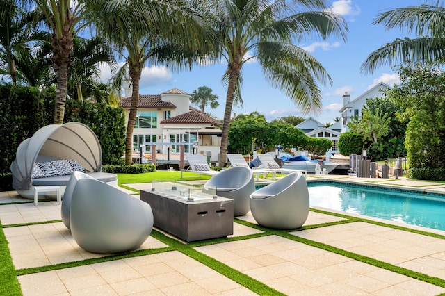 view of swimming pool with a patio