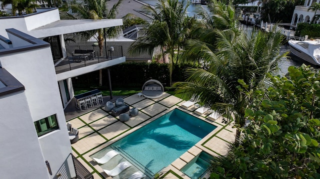 view of pool featuring a patio