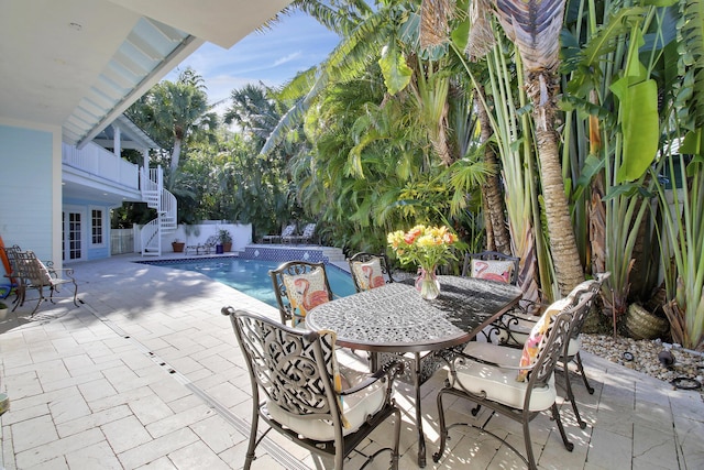 view of swimming pool featuring a patio