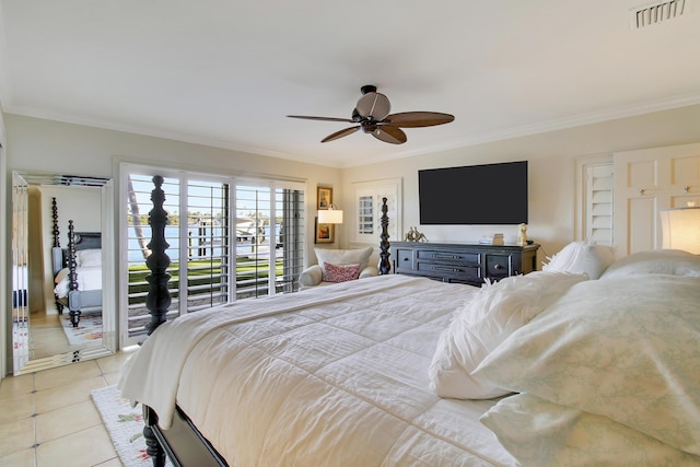 tiled bedroom featuring ceiling fan, ornamental molding, and access to outside