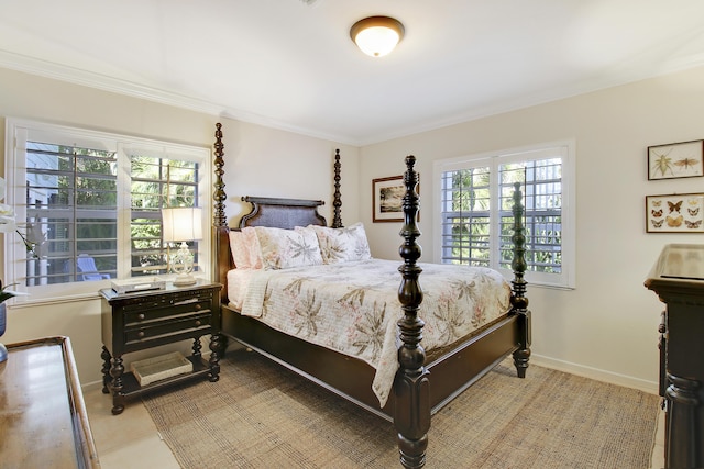 bedroom featuring crown molding