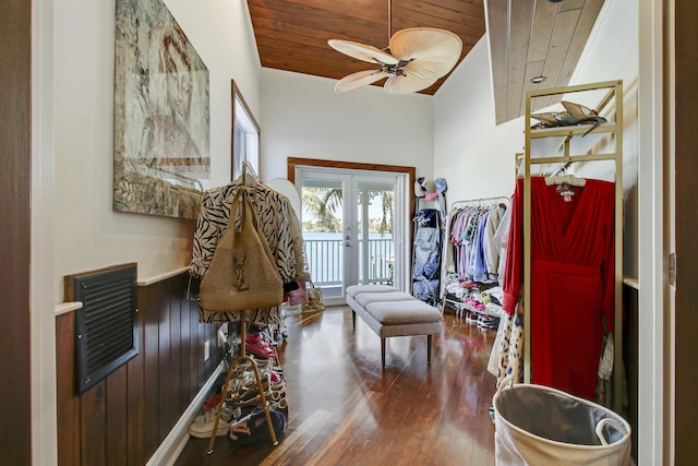 entrance foyer featuring lofted ceiling, wood-type flooring, french doors, ceiling fan, and wooden ceiling