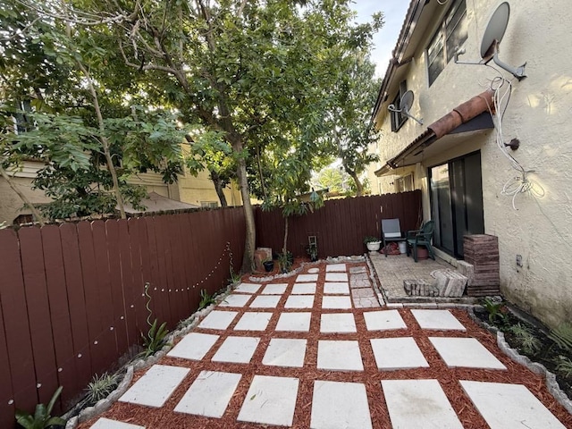 view of patio with a fenced backyard