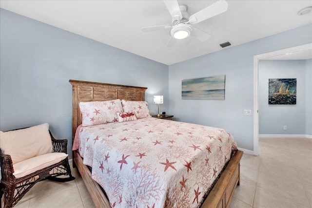 tiled bedroom with ceiling fan