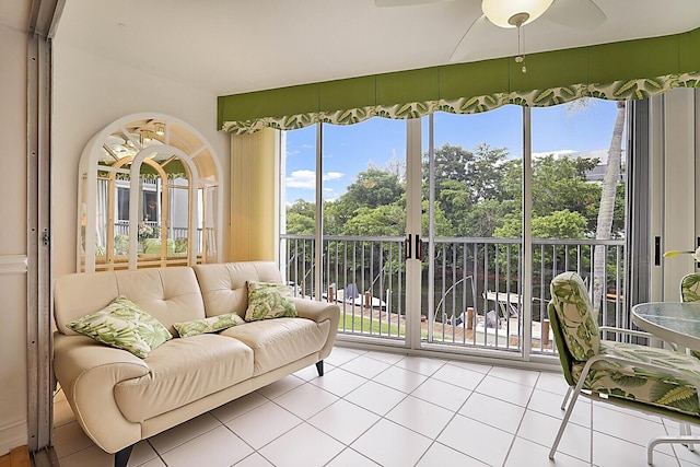 sunroom with ceiling fan