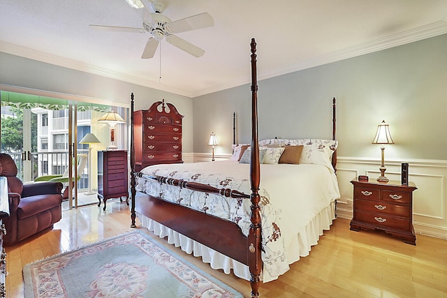 bedroom featuring ceiling fan, ornamental molding, and light hardwood / wood-style flooring