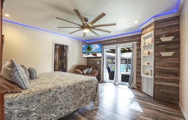 bedroom with hardwood / wood-style flooring, ceiling fan, access to exterior, and ornamental molding