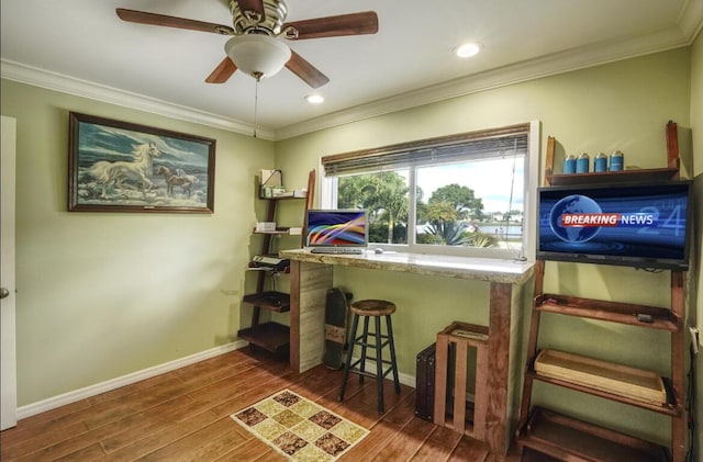 home office featuring ceiling fan and ornamental molding