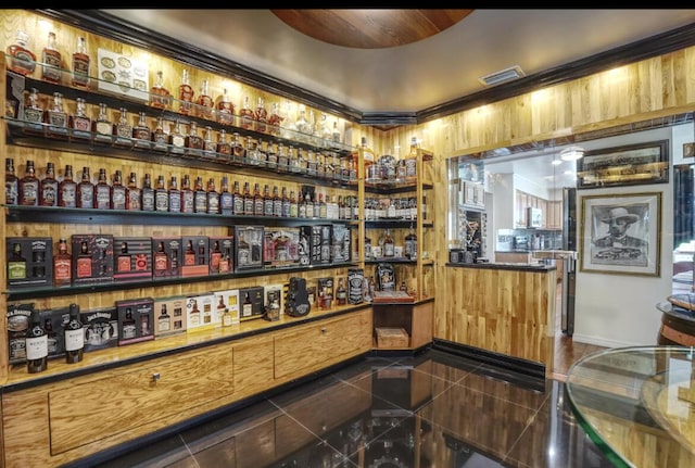 bar with dark tile patterned flooring