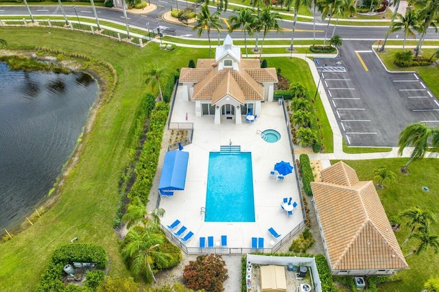 birds eye view of property featuring a water view