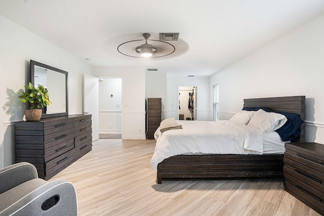 bedroom featuring a spacious closet