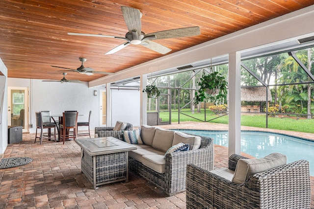 interior space with an outdoor hangout area and glass enclosure