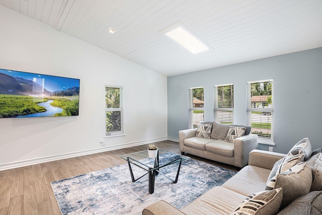 living room with wooden ceiling, vaulted ceiling, and hardwood / wood-style flooring