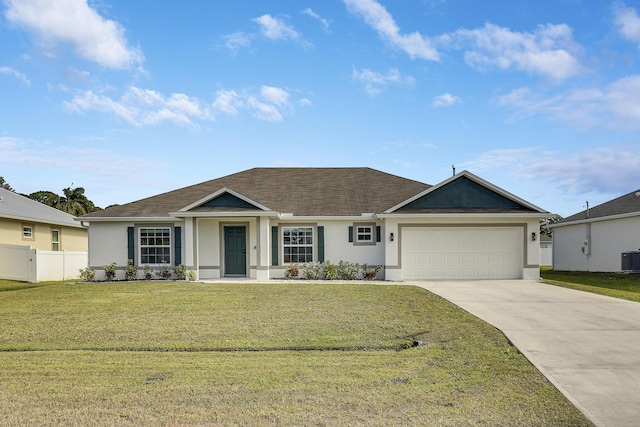 ranch-style house with cooling unit, a front lawn, and a garage