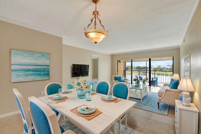 tiled dining room with ornamental molding