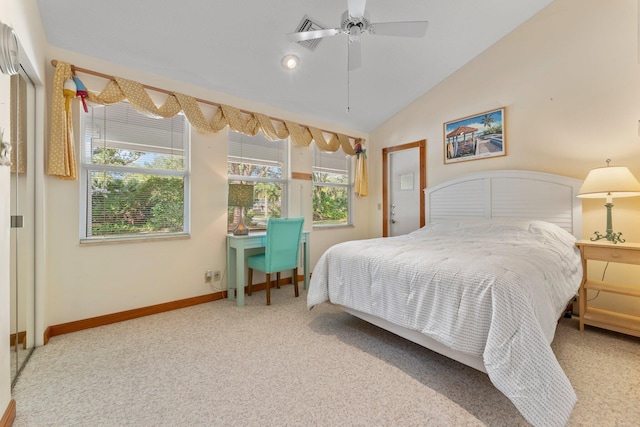 bedroom featuring carpet floors, vaulted ceiling, and ceiling fan