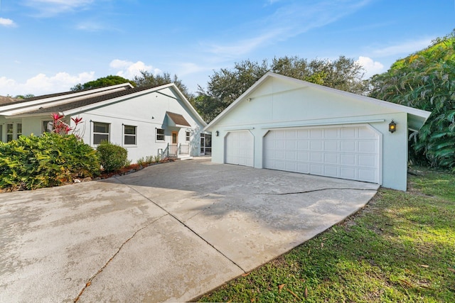 single story home with a garage