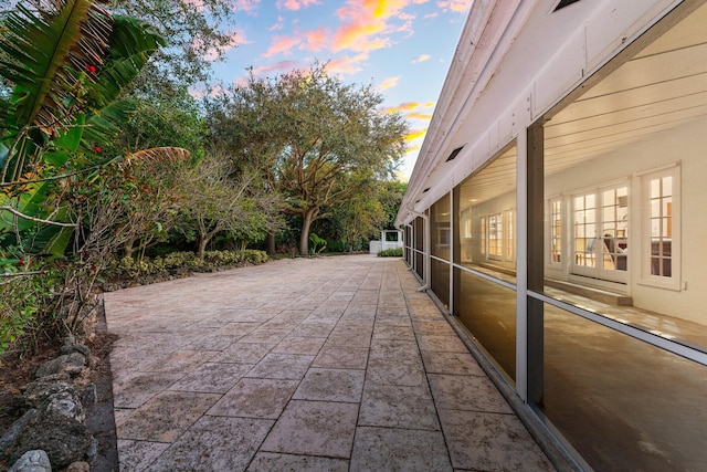 view of patio terrace at dusk