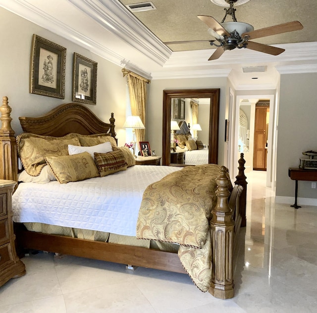 bedroom featuring crown molding, ceiling fan, a tray ceiling, and a textured ceiling