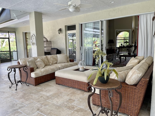 living room with ceiling fan