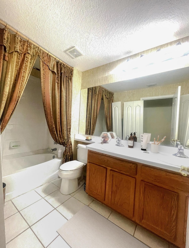 full bathroom featuring toilet, a textured ceiling, tile patterned flooring, shower / bathtub combination with curtain, and vanity