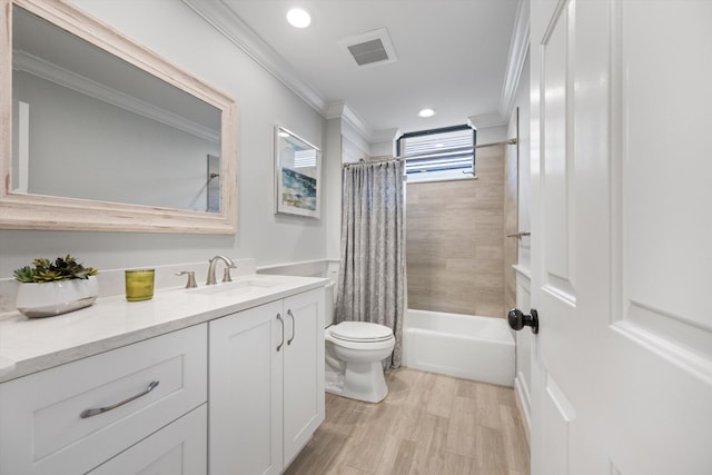 full bathroom with toilet, crown molding, shower / bath combo, and vanity