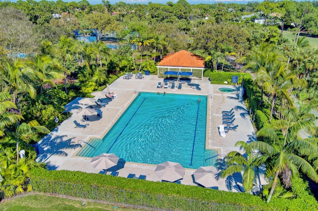 view of swimming pool with a patio and a gazebo