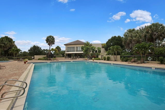 view of swimming pool featuring a patio