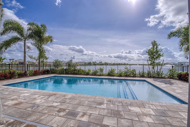 view of swimming pool with a patio