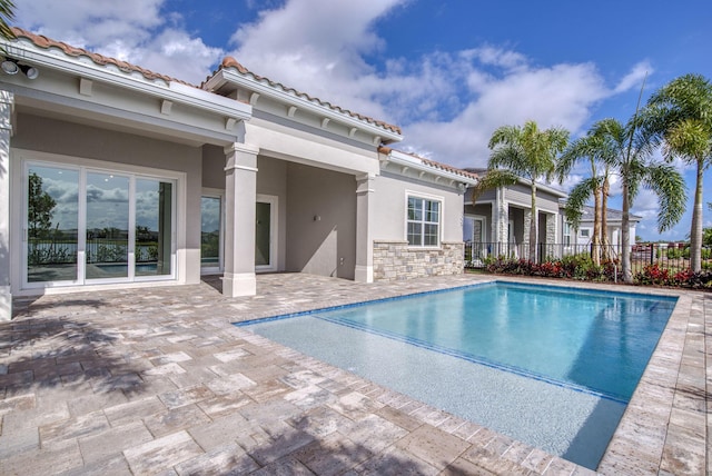 view of pool featuring a patio area