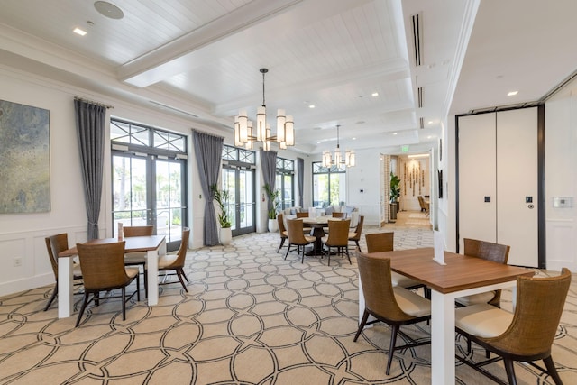 dining area with beam ceiling, crown molding, french doors, and an inviting chandelier