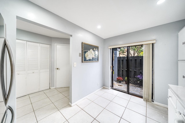 interior space with light tile patterned floors