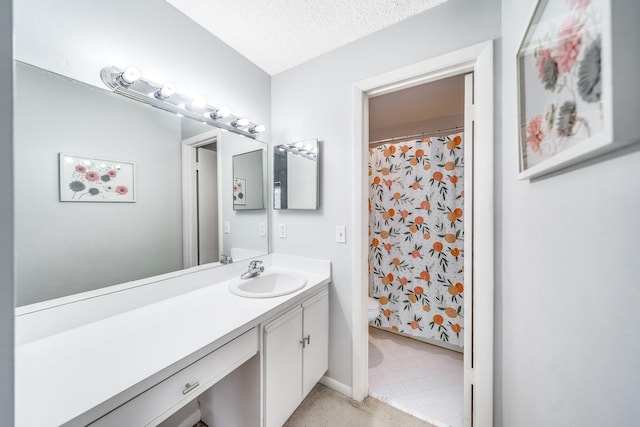 bathroom with vanity, a shower with curtain, a textured ceiling, and toilet