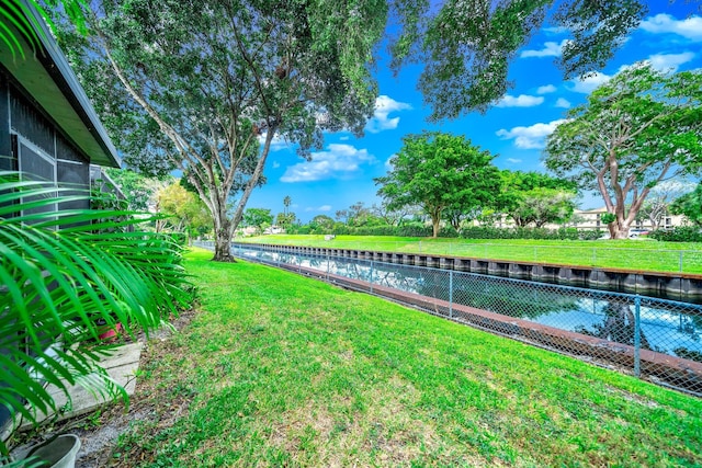 view of yard with a water view