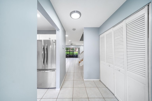 hallway with light tile patterned floors