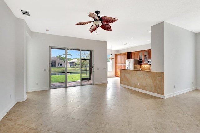 10623 Silverton Ln, Boynton Beach, FL 33437 - unfurnished living room featuring a ceiling fan, baseboards, light tile patterned floors, and recessed lighting