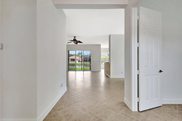 10623 Silverton Ln, Boynton Beach, FL 33437 - hall with baseboards and light tile patterned floors