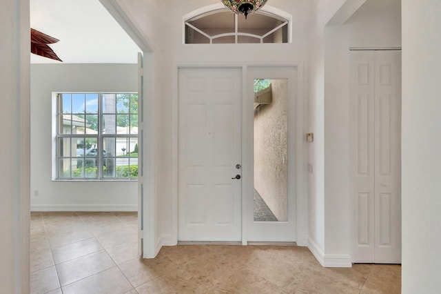10623 Silverton Ln, Boynton Beach, FL 33437 - entryway with light tile patterned floors and baseboards