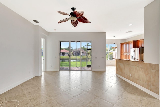 10623 Silverton Ln, Boynton Beach, FL 33437 - empty room with a ceiling fan, baseboards, light tile patterned flooring, and recessed lighting
