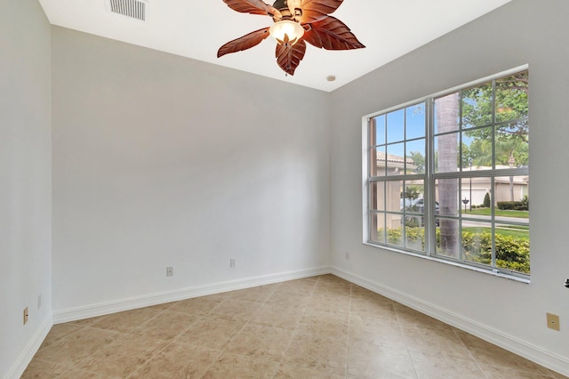 10623 Silverton Ln, Boynton Beach, FL 33437 - spare room with ceiling fan, baseboards, and light tile patterned floors