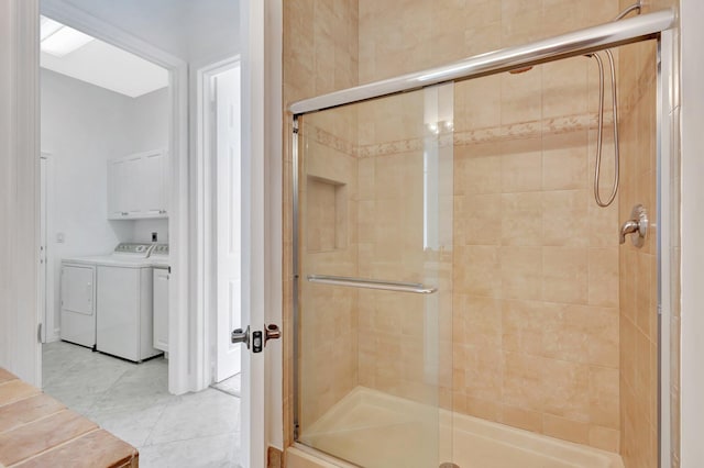 10623 Silverton Ln, Boynton Beach, FL 33437 - bathroom with washer and clothes dryer, a shower stall, and tile patterned flooring