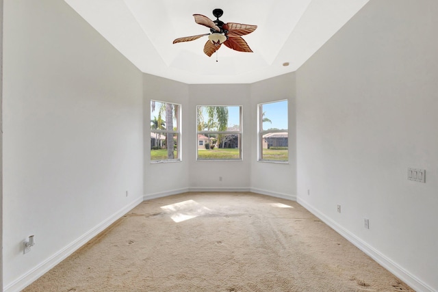 10623 Silverton Ln, Boynton Beach, FL 33437 - unfurnished room with ceiling fan, light colored carpet, a tray ceiling, and baseboards