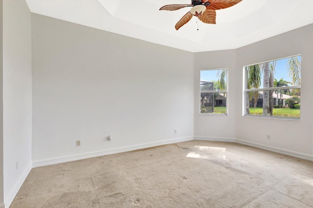 10623 Silverton Ln, Boynton Beach, FL 33437 - empty room featuring light carpet, ceiling fan, and baseboards