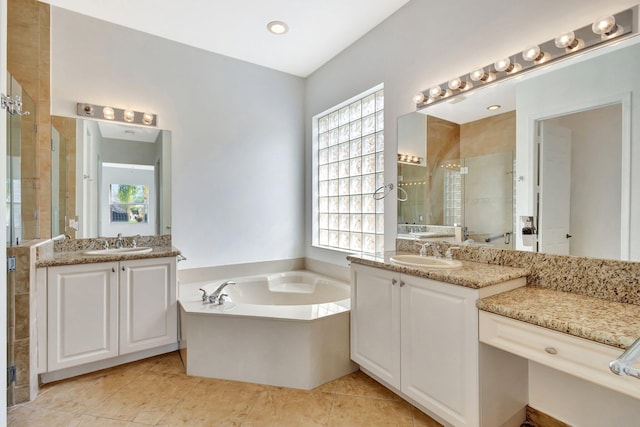 10623 Silverton Ln, Boynton Beach, FL 33437 - bathroom with a shower stall, a garden tub, two vanities, and tile patterned floors