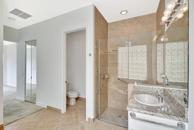 10623 Silverton Ln, Boynton Beach, FL 33437 - bathroom with a stall shower, toilet, vanity, tile patterned floors, and baseboards